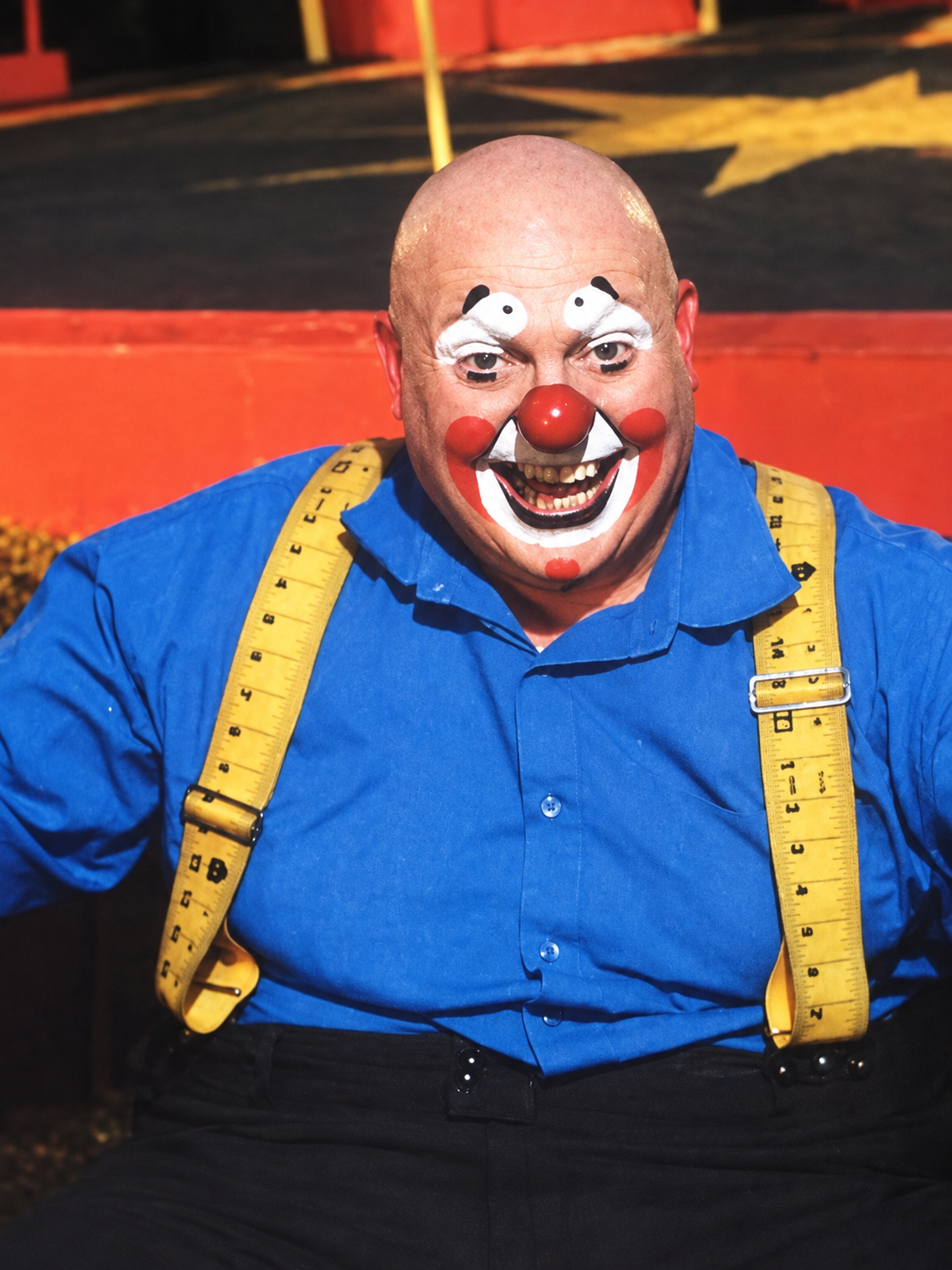Clown in full face paint and costume portrait